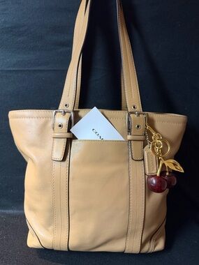 Coach Tan Leather Tote with Cherry Charm Accent